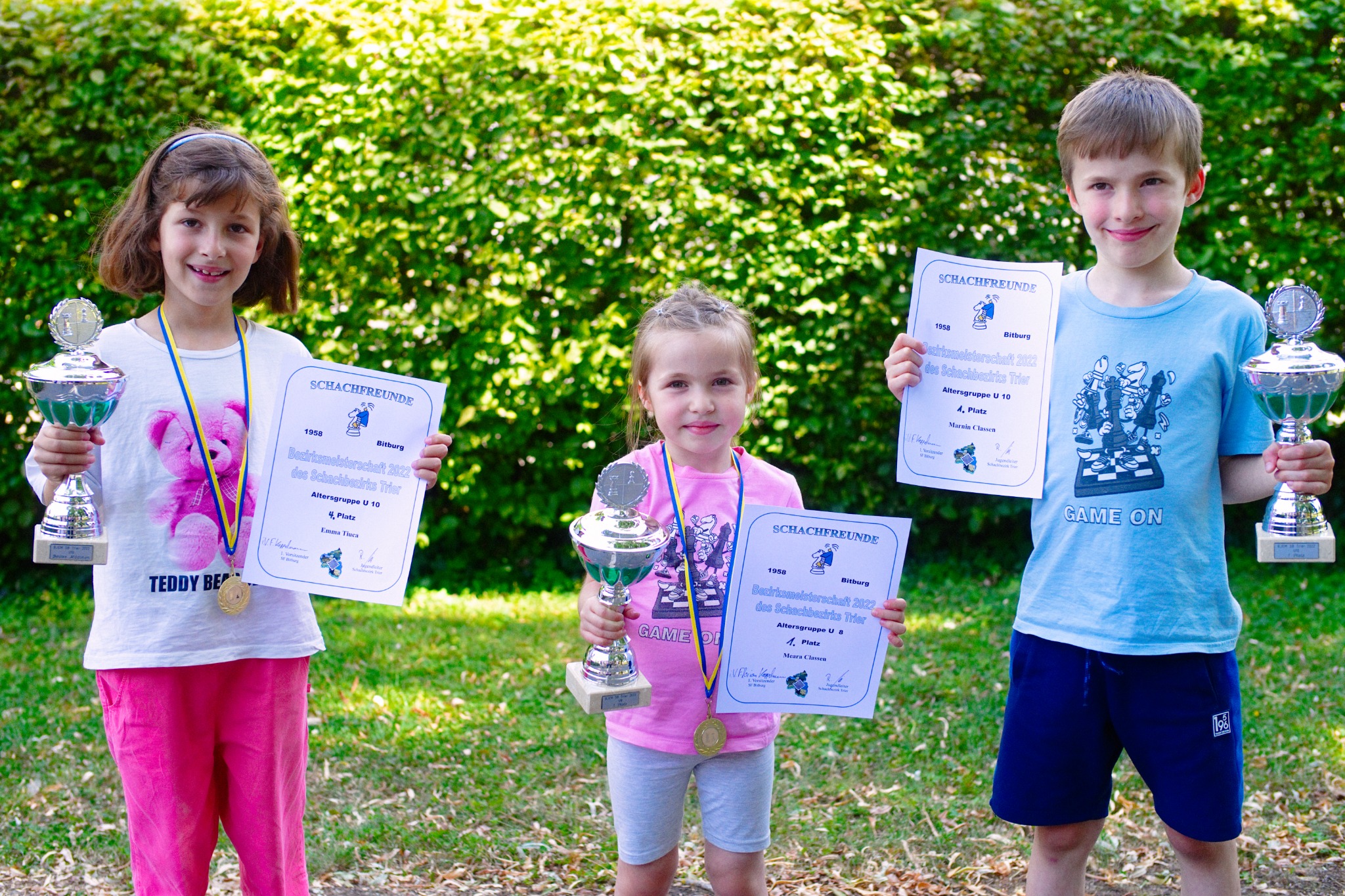Champions: Emma Tiuca (U10w), Meara Classen (U8), Marnin Classen (U10)